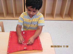 Learning how to snap and button is an important task for little ones, and a great fine motor skill exercise.